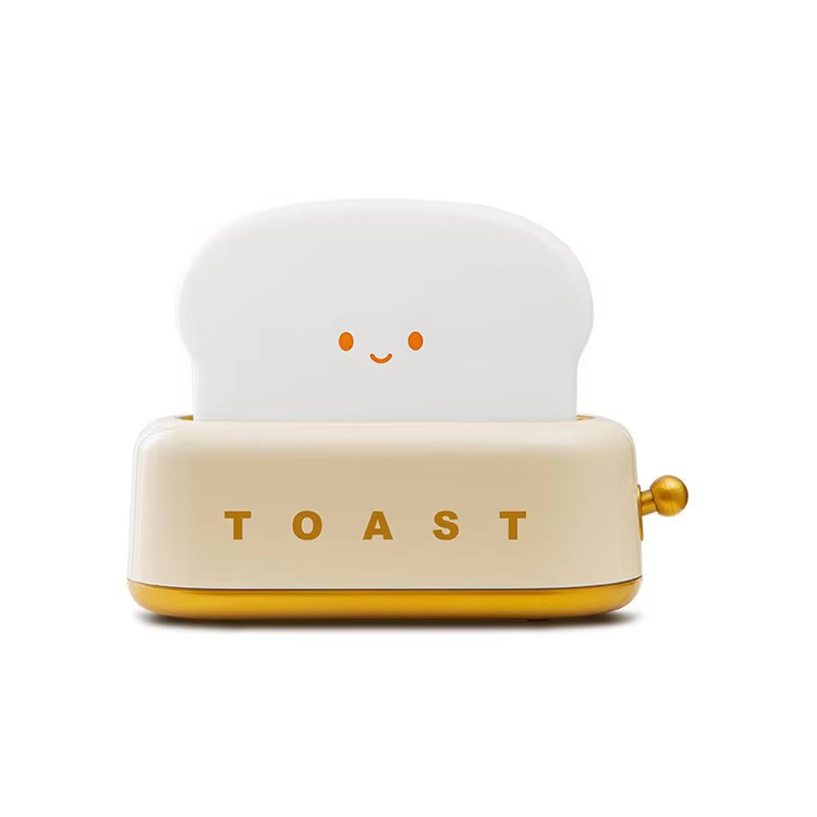 Simpatica luce notturna a LED per la decorazione della camera dei bambini. Lampada da tavolo toast